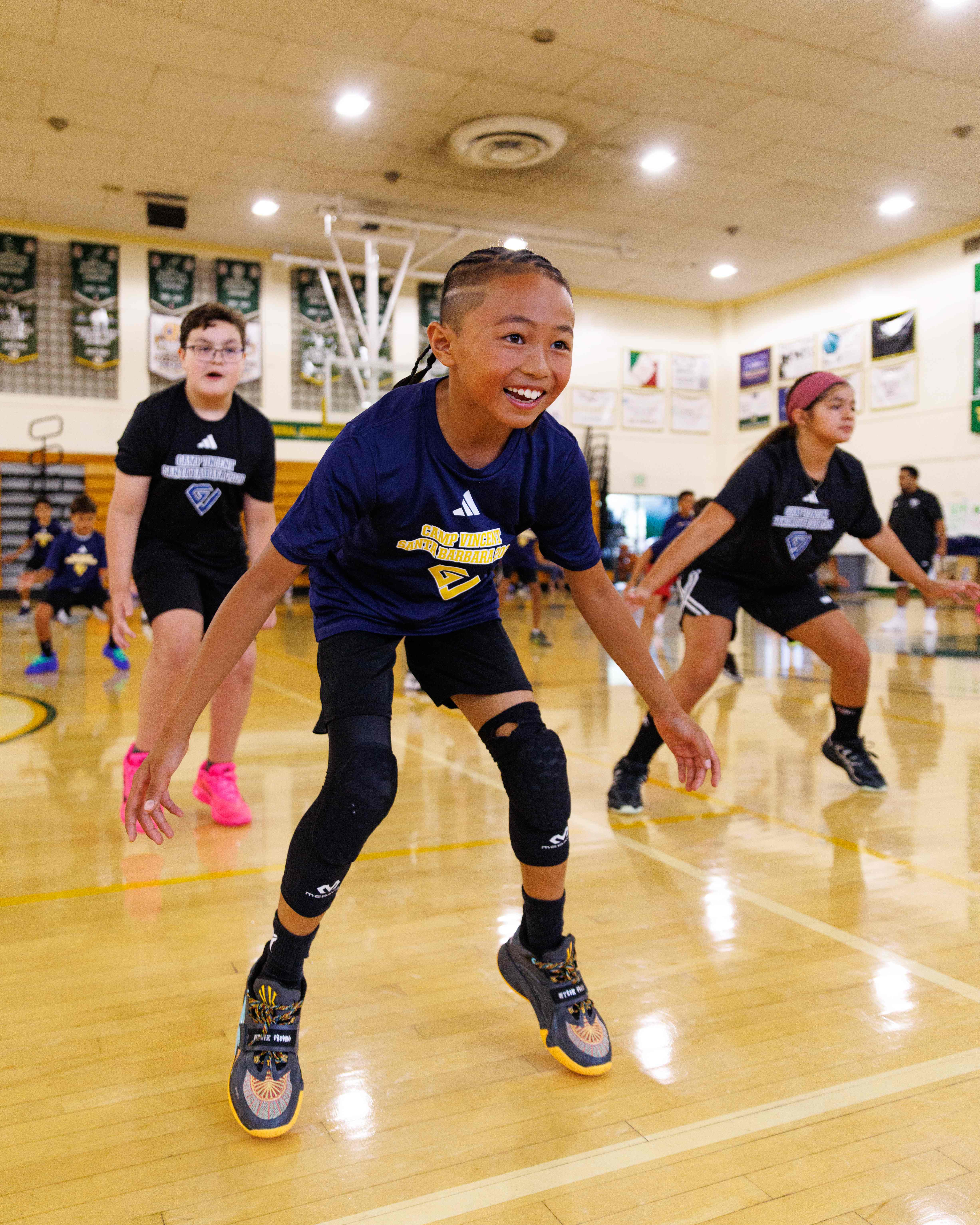 Young Camp Vincent athlete working through a defensive drill
